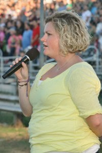 Sally Walters sings the National Anthem.