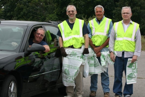 From left, Jack Kehoe driving, Bob Milbrodt, Jim Randolph and Time Ritter before they headed out to I-94 as Adpot-A-Highway volunteers.