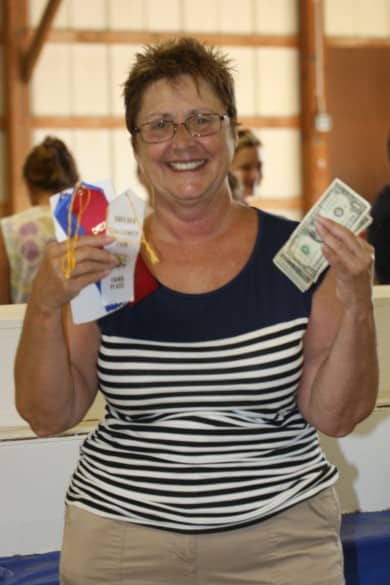 File photo. Judy Metivier, her ribbons and cash