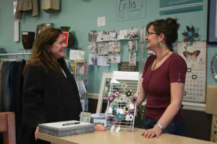 Kathy Finger and Kris Vermilye share a laugh inside Shabby Chic.