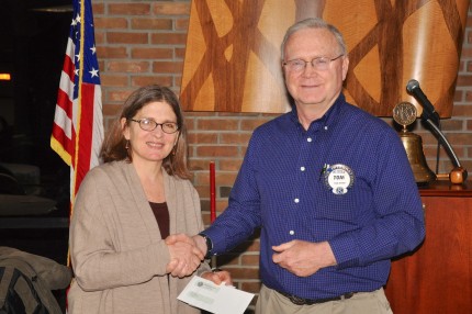 Nancy Paul, director of Faith in Action and Tim Ritter, Chelsea Kiwanis Club president. 