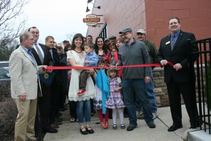 Wait for it. Chris Martinsen stands poised to cut the ribbon on the Chelsea Alehouse Brewery Wednesday night.