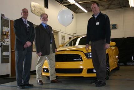 A scene from the Chelsea Area Chamber of Commerce after hours event at Village Motor Sales.