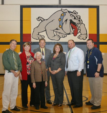 Bulldog pride. State Board of Education members Michelle Fecteau (in red) and Kathleen Strauss (in front) inside the Beach Middle School gym. 