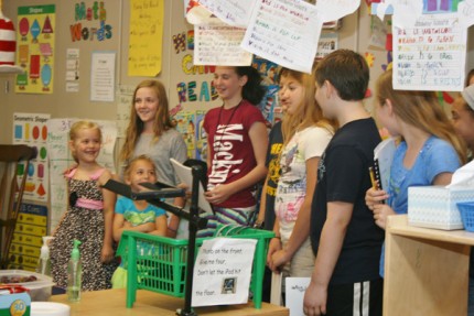 Kindergarteners unite with their 6th-grade buddies Wednesday.