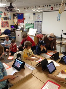 Courtesy photo. State board of education members learn about center-based learning using iPads at North Creek Elementary. 