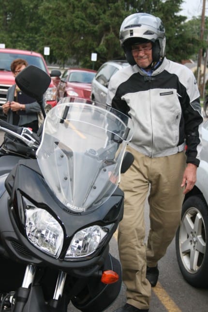Council Member Rod Anderson poses with his new motorcycle.