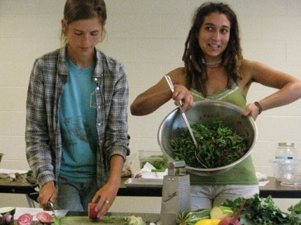 Interns Erin (left) and Beth from Tantre Farm were at the Chelsea Senior Center to give a cooking demo, “From the Garden – Cooking in Season,” as part of the Intergenerational Garden series co-sponsored by Chelsea Community Kitchen.