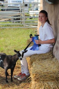 Brianna Loucks, intermediate showmanship winner and her goat ,Piper.