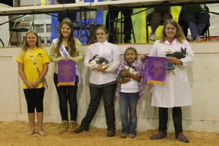 Allison Bellairs took grand champion meat pen rabbits and they sold for $250 to Gar's Plumbing. 