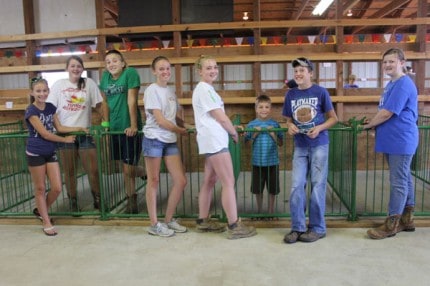 Some of the about 38 youth who will show their pigs on Tuesday, Aug. 20 at 6 p.m.