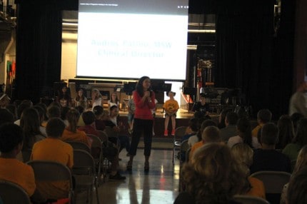 Katheryn McCalla introduces members of the leadership class at an assembly Friday afternoon.