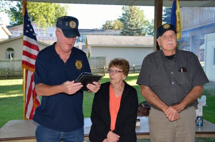 Courtesy photo by Chuck Reed. Craig Maier reads the Digger Award plaque to winner Diane Fouty whil Commander tom Zackvowich listens.  