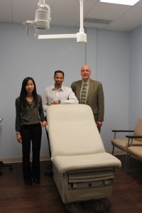 Vu Singal, Dr. Anil Singal and Bruce Szcodronski inside one of the exam rooms inside Adult and Pediatric Dermatology.
