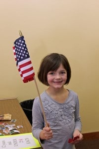 Every child was given an American flag during the 25-Cent Kids Carnival. 