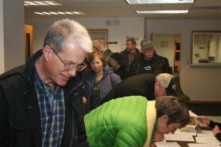 Photo by Alan Scafuri. People signing in for hearing.