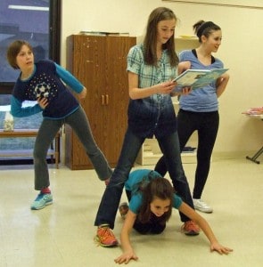 Courtesy photo by Crystal Hayduk. Youth actors practice their lines and scene.