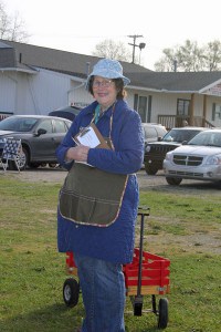 Susan Moore ready to assist customers to the recent Chelsea Area Garden Club Plant sale.