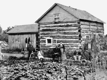 Early farm with log cabin from the state archives.