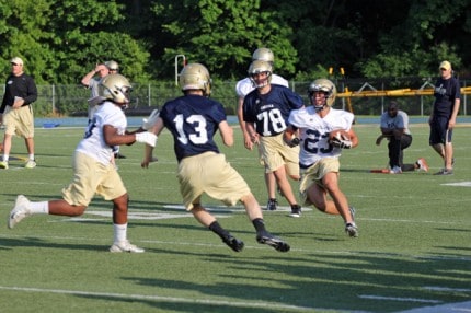 Jeremy Policht on a nice scamper duing summer football camp.