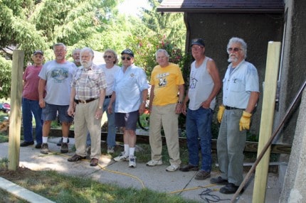 Some of the volunteers who helped build a handicapped ramp for the wife of Ron Harris (