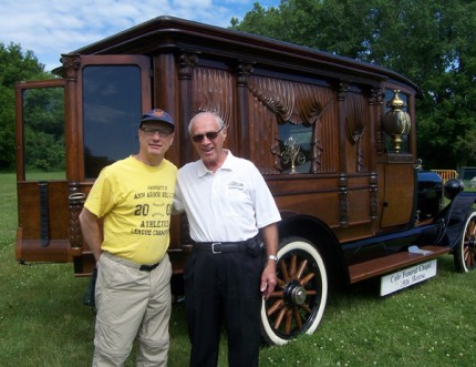 Photo by Lisa Carolin. Mike Jackson, owner of Vogels and Foster and Don Cole of Cole Funeral Chapel pose for a photo at History Fest Sunday in Timbertown.