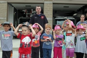 Friendly Firefighter Bill (without his turnout gear on) and some of the children.