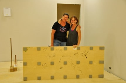 Rhondra and Wendy with the last panel of flooring. 