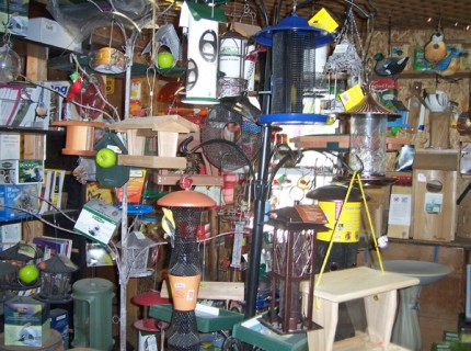 Photo by Lisa Carolin. Some of the many bird feeders and bird houses available at Farmer's Supply.