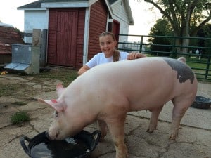 Courtesy photo. Natalie Schneider and Rufus at home on the farm. 
