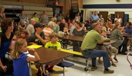 Photo by Lisa Carolin. Parents and students listen to orientation information for North Creek Elementary School. 