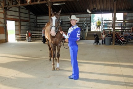Taylor Schrock and her western horse.