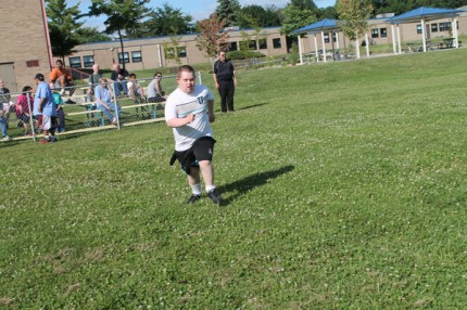 Photo by Joe Yekulis. A St. Louis center resident prepares for Run for the Rolls on Aug. 23.