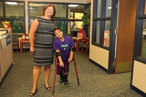 South Meadows Elementary Principal Stacie Battaglia and a student.