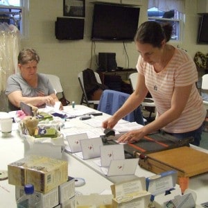 Photo by Crystal Hayduk of church members helping to fill Hearts of Hope boxes. 
