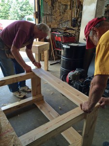Courtesy photo. St. Louis Center volunteers build two handicap ramps thanks to a Chelsea Area Garden Club grant.