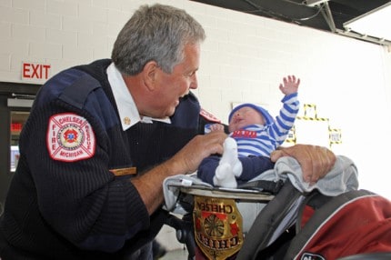 Chelsea Fire Chief Jim Payeur and his youngest grand child. 