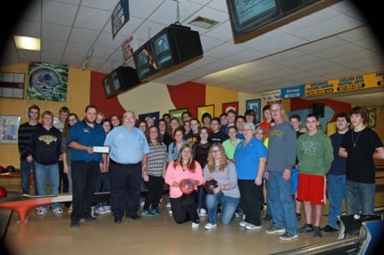 On Monday afternoon, the Chelsea Bowling Team received a large donation from Rick and Joni Benson of Benson Hearing. 