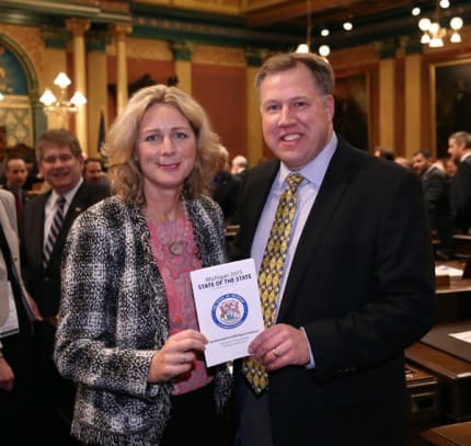 Courtesy photo.  State Representative Gretchen Driskell (D-Saline) attended Gov. Rick Snyder's State of the State address on Tuesday, Jan. 20, at the state Capitol. Joining her is Dexter Mayor Shawn Keough.