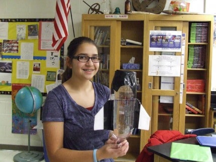 Photo by Crystal Hayduk. Madelyn O’Hara shows off one of her bottle rocket designs.