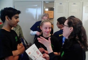Photo by Crystal Hayduk. Saif Ghani (left) and Andrea Kowalski in a final meeting with Coach Dianne Dobos before the Anatomy test. 