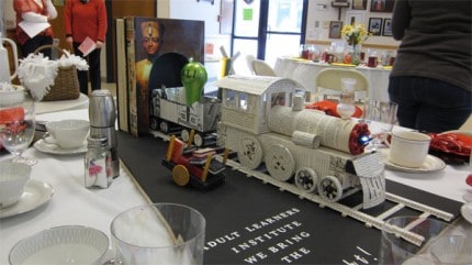 Courtesy photo of the Train of Lifelong Learning table at Saturday's Festival of Tables event, a fundraiser for the Chelsea Senior Center. 