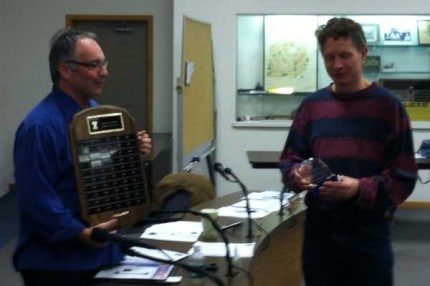 Patrick Zieske receives the citizen of the year award from Supervisor Scott Cooper.