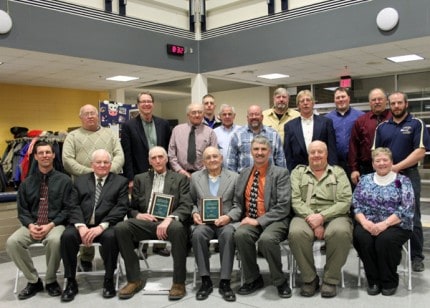 The Dairy Livestock Council officers and board members with this year's distinguished farmers Archie Bradbury and Albert Rulig in the center with their awards.