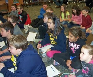 Photo by Lisa Carolin. Fifth graders listen to author Jonathan Rand during the recent Authors in Chelsea.  