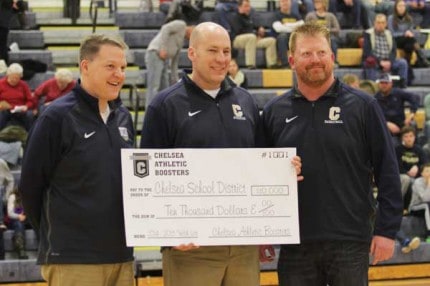 Photo by Alan Scafuri. The Chelsea Athletic Boosters donated $10,000 to the athletic department Friday night. 