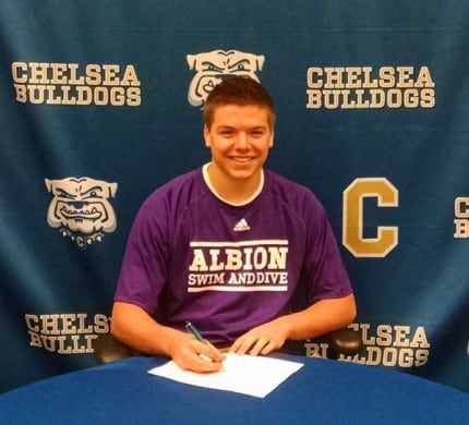 Courtesy photo. Jake Burris signs a letter of intent to dive for Albion College. 