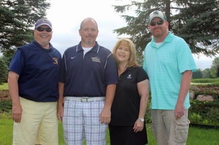 File photo. Bo Skelton, Matt Mason, Tammy Mason and Matt Cole before the start of the 24th annual Bo Skelton scramble golf outing presented by the Chelsea Athletic Boosters.