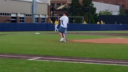 Courtesy photo by Cathy Riedel. xx Riedel threw the first pitch at the baseball game between the University of Michigan and Northwestern on May 9 in celebration of Teacher Appreciation Week. 