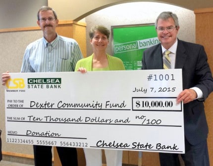 Photo Cutline from Left: Steve Brouwer, Dexter Community Fund (DCF) Advisory Committee member,  Julie Schumaker, DCF co-chair and John Mann, Chelsea State Bank President and CEO.